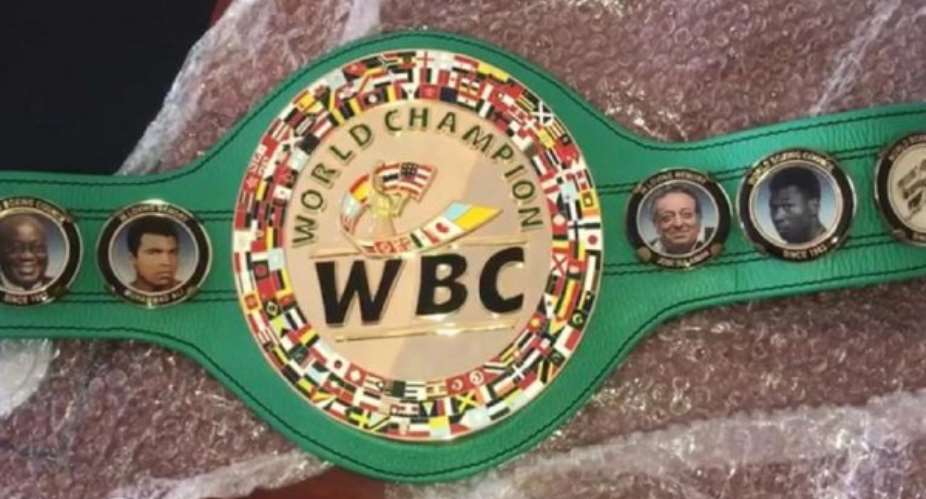WBC Awards DK Poison A New Belt With Akufo-Addo Image Embossed