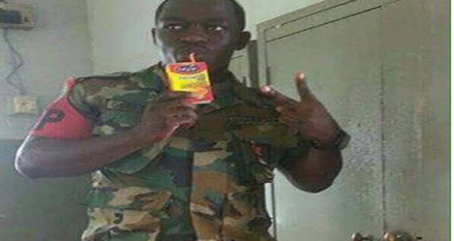 Madness! – Is Ghana Military That Partisan To Arrest A Soldier Posting A Close-Up Selfie Of Himself Sipping Kalypo?