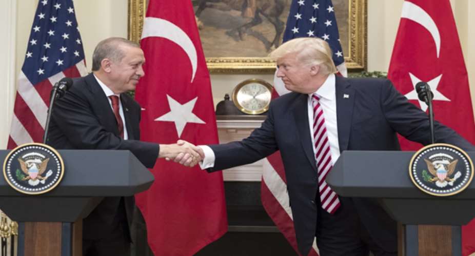 Turkish President Recep Tayyip Erdogan shakes hands with President Trump. Michael ReynoldsBloomberg