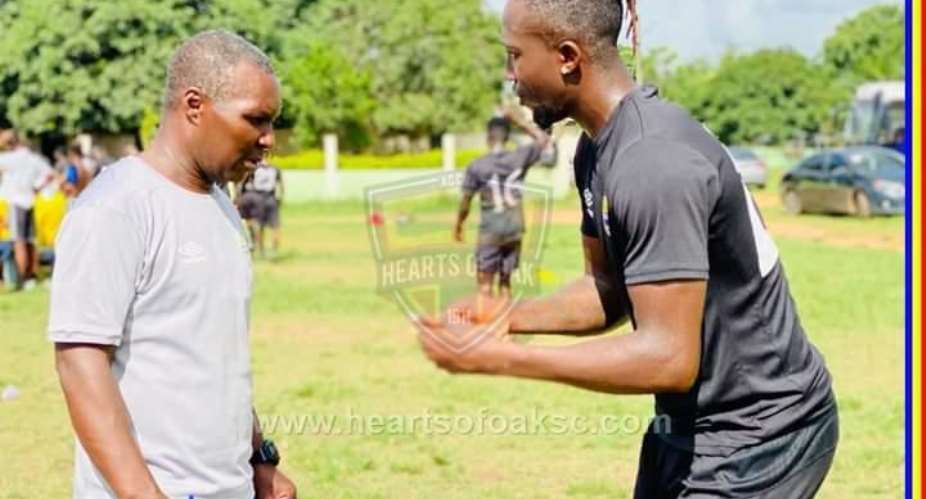 Hearts of Oak Coach Edward Nii Odoom Left, Danjuma Kuti Right.