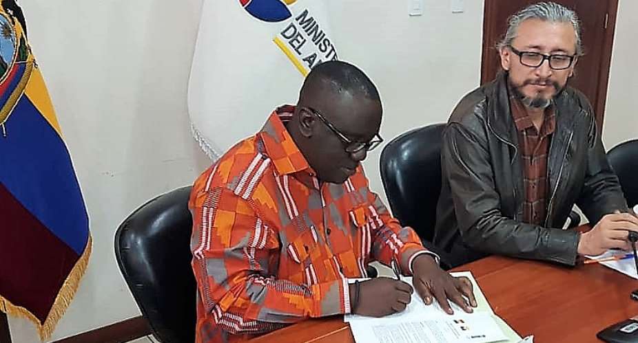Mr Kwadwo Owusu Afriyie signing the agreement on behalf of Ghana