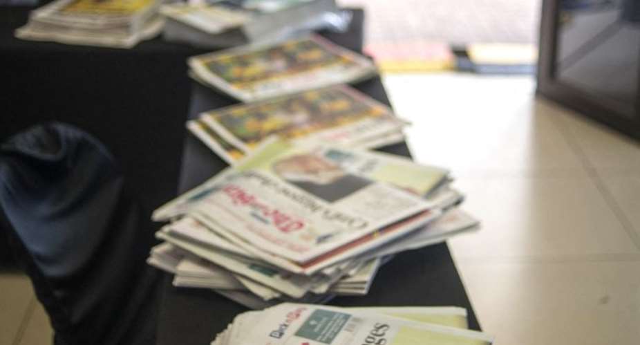 A table of newspapers at the 2017 African National Congress conference in Johannesburg, South Africa as pictured on December 19, 2017. AFPMujahid Safodien