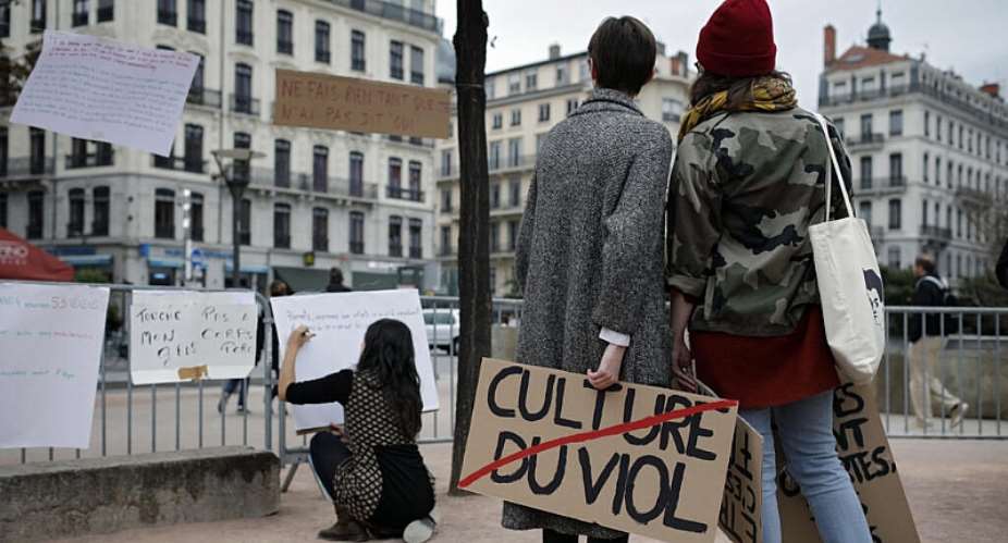 Campaigners demonstrate against sexual violence and harassment in France. - AP - Laurent Cipriani