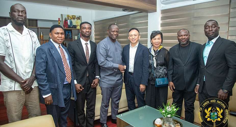 Minister for Lands and Natural Resources, Hon. Emmanuel Armah-Kofi Buah engages a delegation from Guangdong Shengmai Tech Co. Ltd