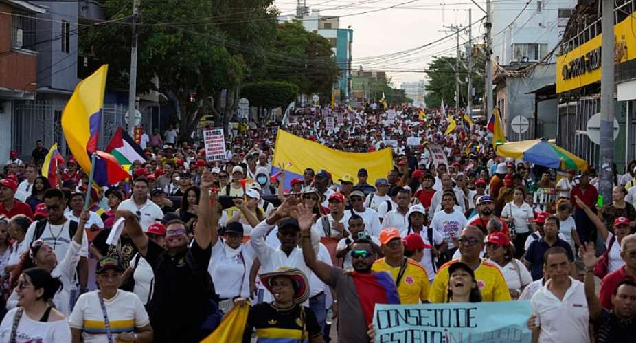 People they take part in a nationwide protest against the government of Colombian President Abelardo De La Espriella and its proposed labour and pension reforms, in Colombia, October 14, 2026. -  Charlie cordero, Reuters