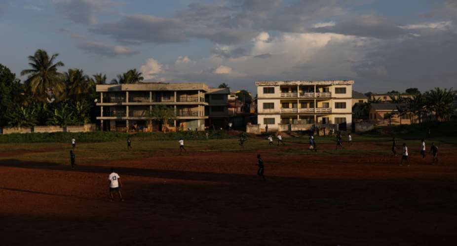 People play soccer in Mampong, a small town in the Ashanti region, Ghana, in July 2019. A journalist was charged with publishing 'false news' in October 2020 for a report on a pre-election crisis in Ashanti. ReutersSiphiwe Sibeko