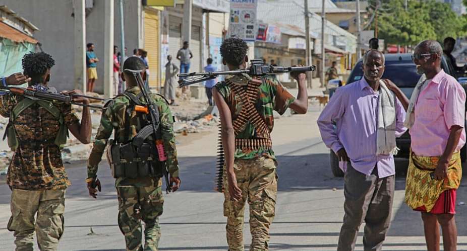 Somali soldiers patrol a street after supporters of opposition political figures and state security forces clashed in Mogadishu in June. - AP Photo/Farah Abdi Warsameh - Farah Abdi Warsameh
