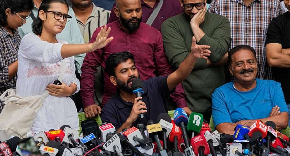 Abhijeet Dipke, founder of the Cockroach Janta Party, centre, Neha Bora, president of the All India Students Association, left, and Indian actor Prakash Raj, right, address a press conference in New Delhi, Thursday, October 15, 2026. -  Manish Swarup, AP