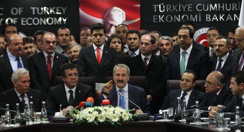 Zafer Caglayan, center above, a former Turkish economy minister, is among four Turkish citizens recently indicted by federal prosecutors in New York.