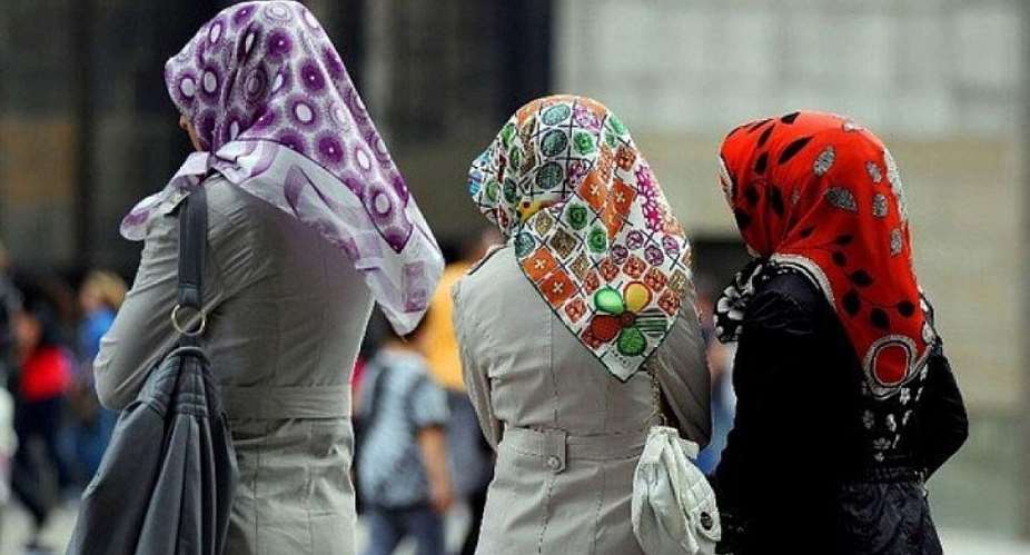 Macron warns against stigmatising Muslims as headscarf row deepens