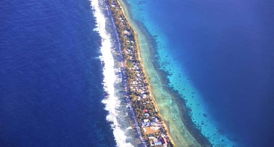 An aerial view of Funafuti, Tuvalu, on 6 September 2024. Rising seas threaten to make much of the Pacific country uninhabitable, while a divide over fossil fuels persists ahead of Cop31 in Turkey. - REUTERS - Kirsty Needham