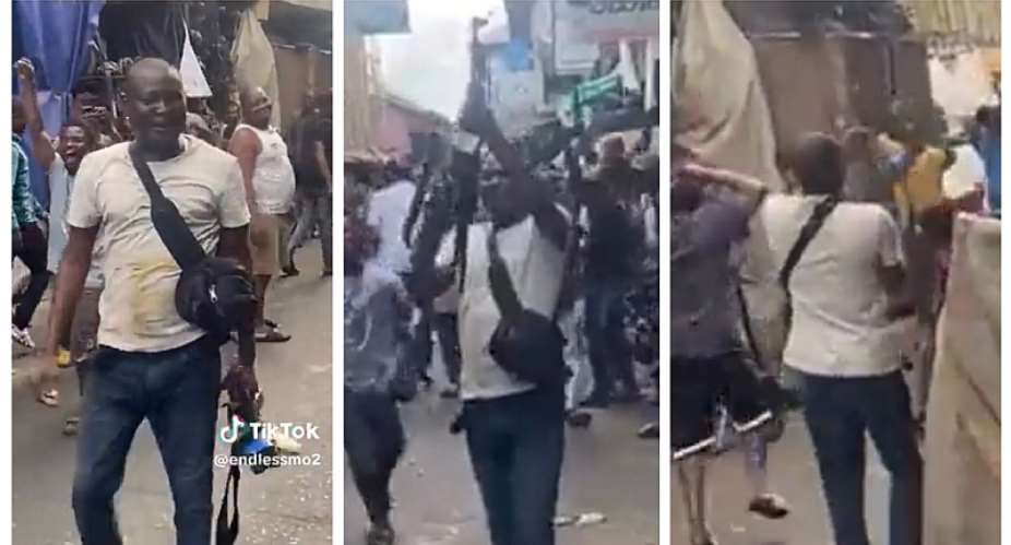 Man firing AK-47 gun to celebrate market reopening arrested VIDEO