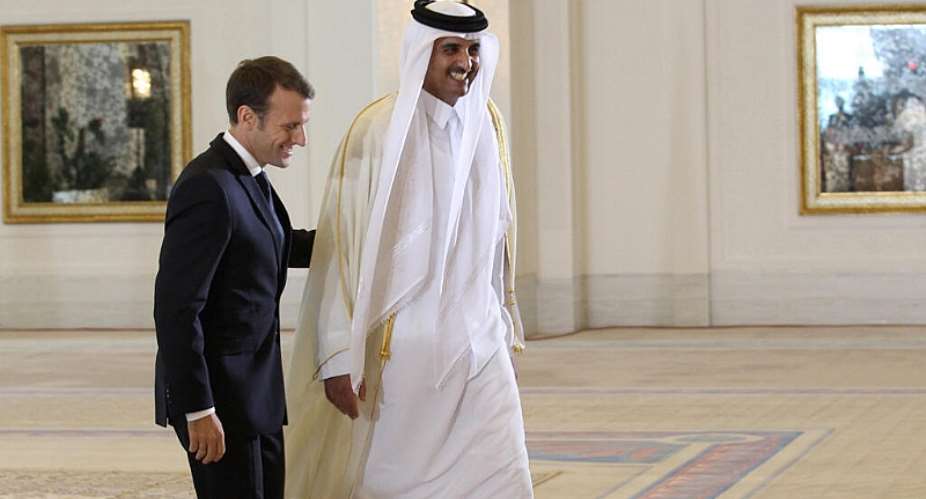 French President Emmanuel Macron with Qatar’s Emir Sheikh Tamim bin Hamad Al Thani in Doha on 7 December 2017. Macron returns to Qatar this week as part of a four-country Gulf tour. -  REUTERS/Naseem Zeitoon
