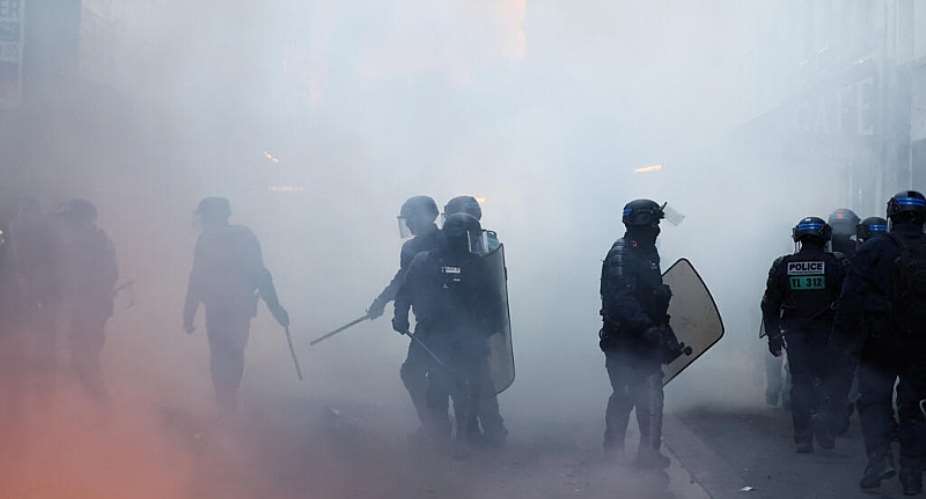 Riot police operate during civil unrest in Paris on October 18, 2026. -  Abdul Saboor, Reuters