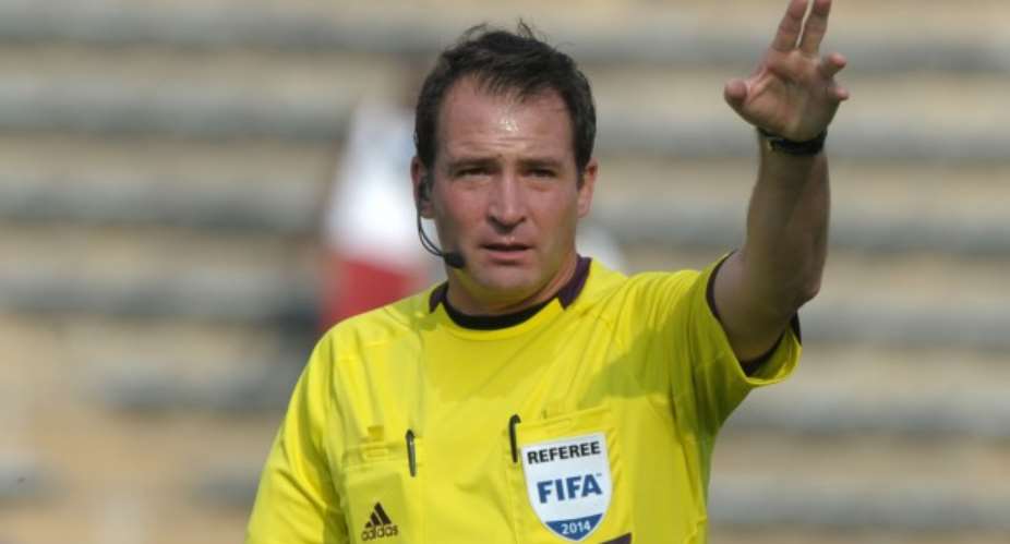 Referee Daniel Bennett of south Africa
