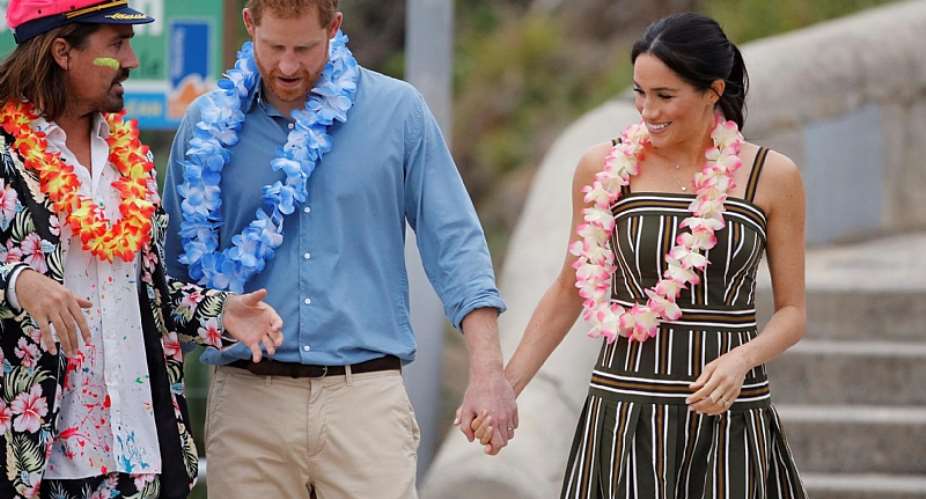 The duke and duchess were greeted by colourful outfits at Bondi Beach  GETTY IMAGES