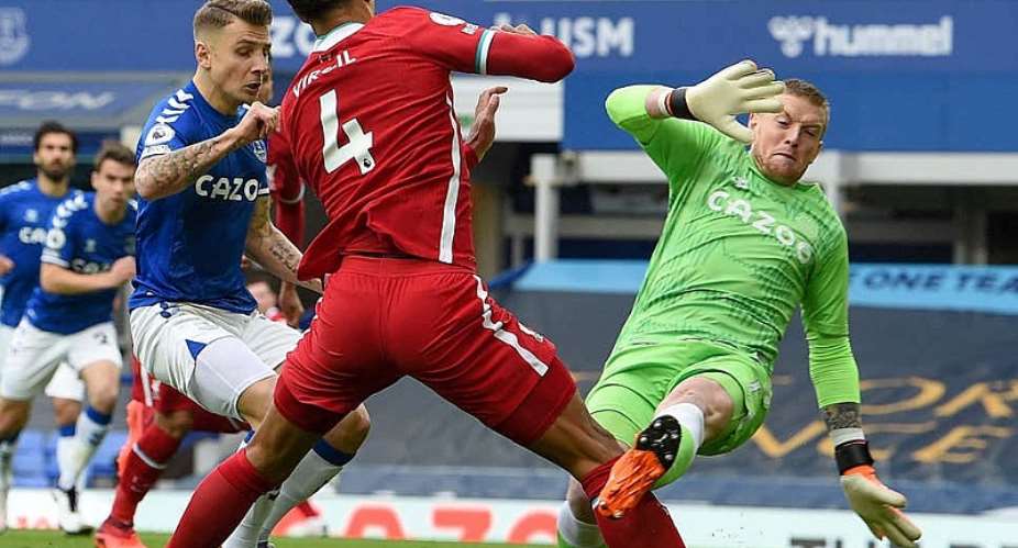 Van Dijk could not continue after Pickford's challenge on him in the first half of the Merseyside derby