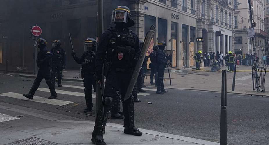Riot police face protesters during a demonstration against rising living costs and in support of students’ grievances in Paris on October 17, 2026. -  Laurent Cipriani, AP