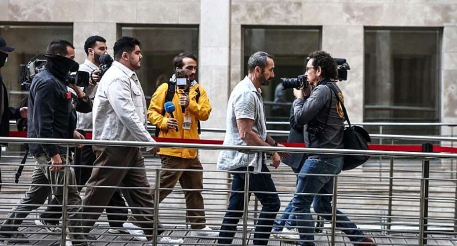 Amine Kessaci (2ndL), French anti-drug activist and Marseille city councillor, arrives at the criminal court in Aix-en-Provence, southeastern France, on 19 October, 2026, on the opening day of the trial of five men accused of involvement in the murders of his brother Brahim Chabane, Reda Khaldi and Nassim Loubani, who were killed in Marseille between December 2020 and January 2021. -  AFP/Thibaud Moritz