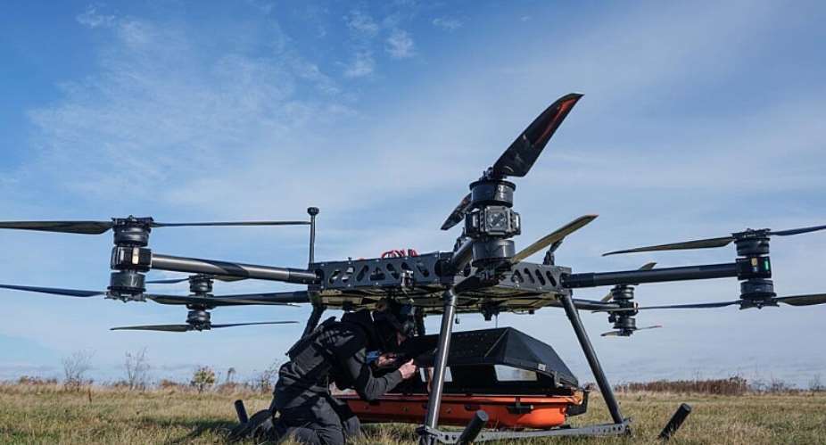 A representative of the SkyFall drone company climbs into a medical module of the StarGate drone before a demonstration flight at an undisclosed location in Ukraine on Wednesday, October 14, 2026. -  Evgeniy Maloletk, AP Photo