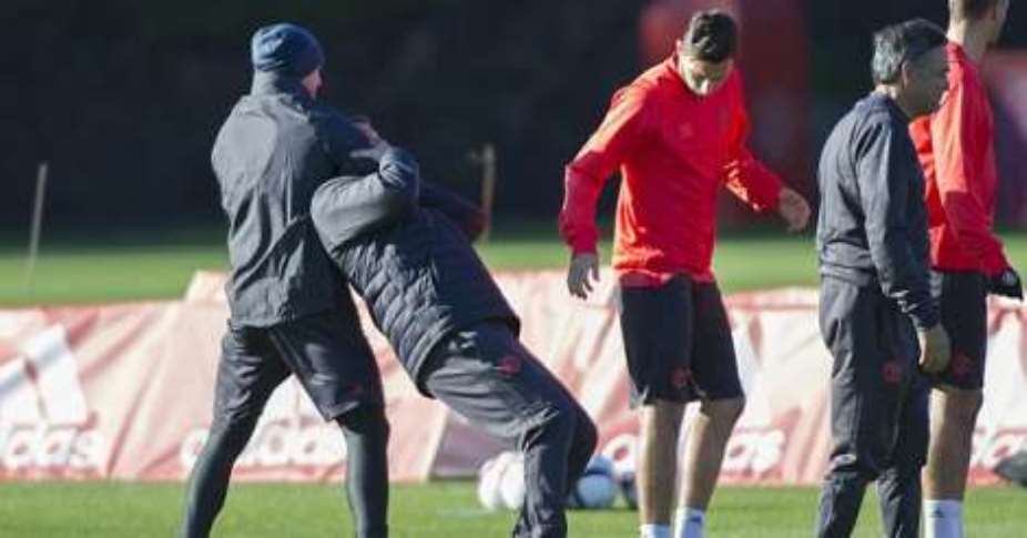 Premier League: Wayne Rooney picks play-fights with two members of Manchester United's backroom staff