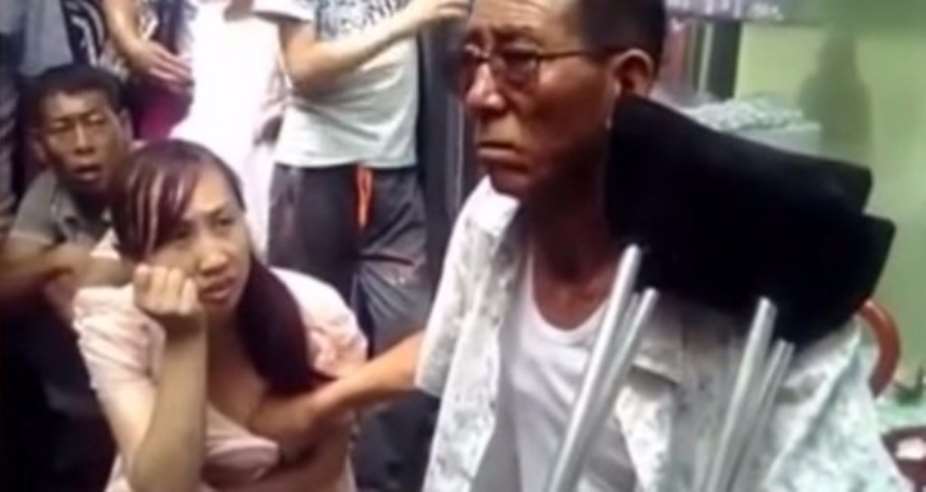 Mystical Chinese man claims he can predict a woman's future by fondling her breasts