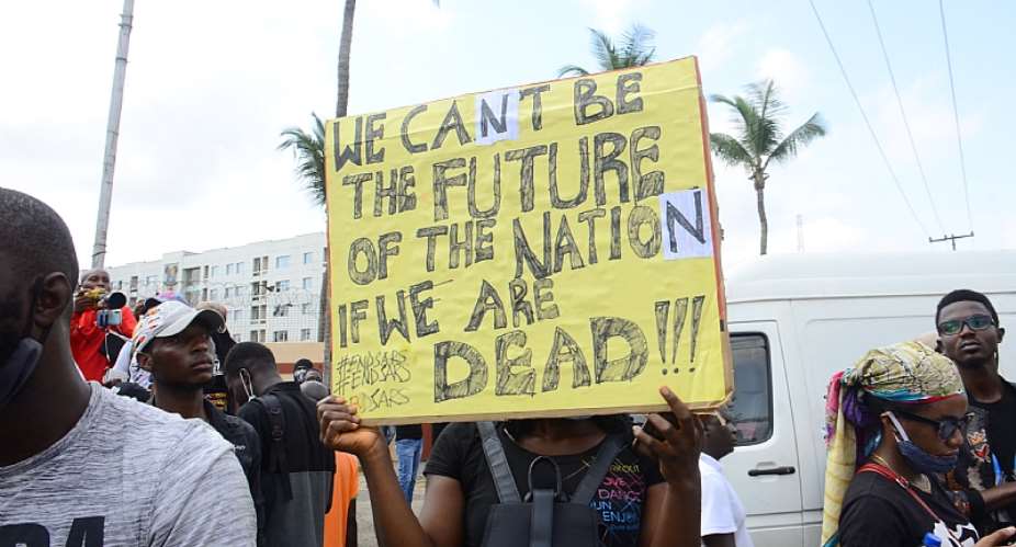 Nigerian youths protest against the police brutality. - Source: Photo by Olukayode JaiyeolaNurPhoto via Getty Images