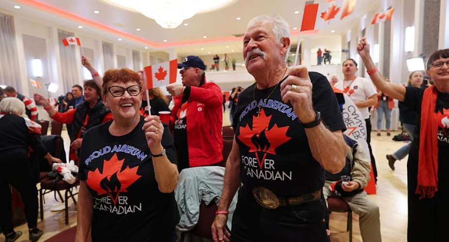 Supporters cheer as results begin to display at the pro-Canada watch party in Edmonton, Alberta Monday, 19 October 2026. -  James Maclennan / The CanadianPress via AP