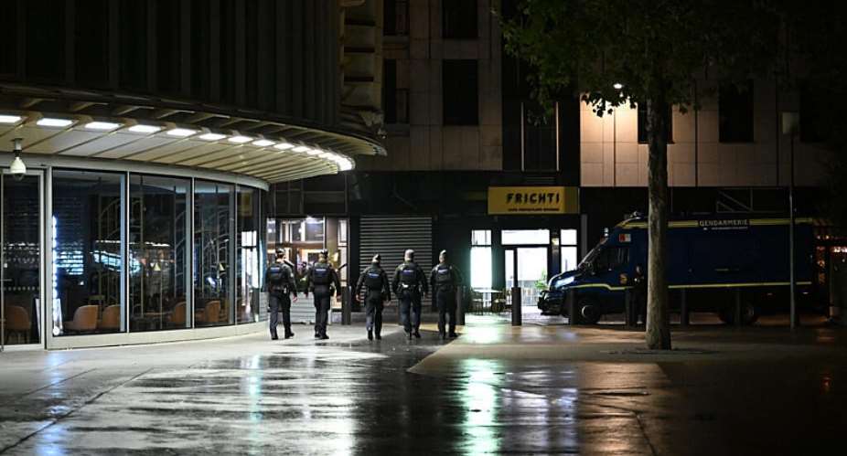 Policemen patrol during an overnight curfew in Paris on Tuesday, 20 October. - AP Photo/Emma Da Silva - Emma Da Silva