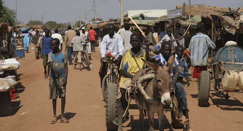 File photo: Residents at the market in the town of Abyei, central Sudan, Wednesday, December 12, 2007. -  Alfred de Montesquiou, AP