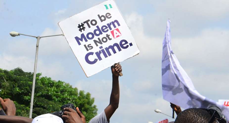 Nigerian youths are often stereotyped and harassed by the police for being in possession of a laptop or iPhone.  - Source: Photo by Olukayode JaiyeolaNurPhoto via Getty Images