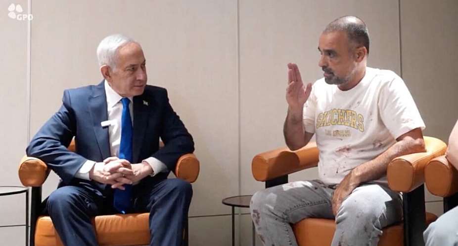Israeli Prime Minister Benjamin Netanyahu meets Yaniv Hayun, a passenger on the FlyDubai flight bound for Israel from the United Arab Emirates, which was diverted to Saudi Arabia following an emergency signal, at the Ben Gurion Airport, Israel, October 1, 2026. -  GPO via Reuters
