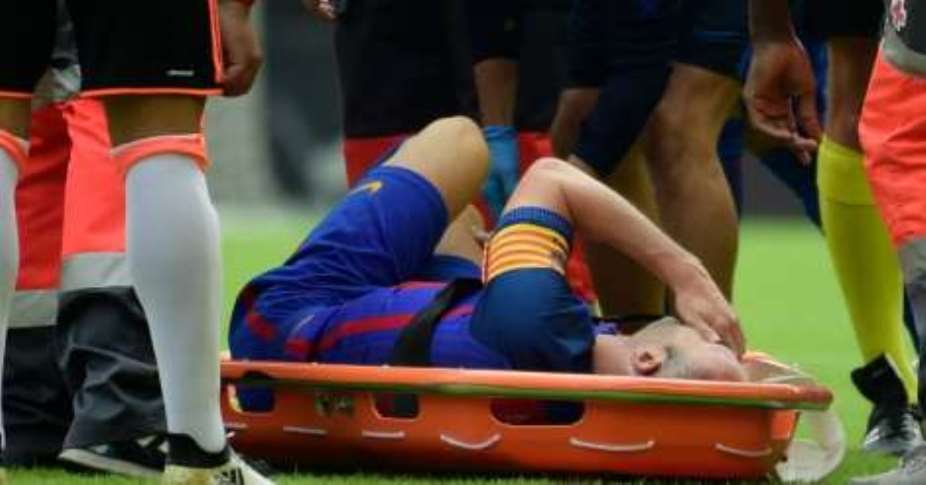 Barcelona: Tearful Iniesta suffers knee ligament damage