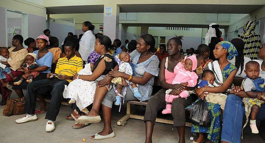 People wait for care at a Kenyan clinic. - Source: Photo by Wendy StoneCorbis via Getty Images