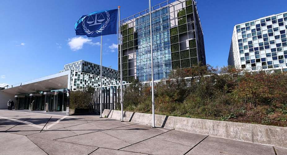 People stand outside the International Criminal Court (ICC) in The Hague, Netherlands on September 22, 2025. -  Piroschka Van De Wouw, Reuters