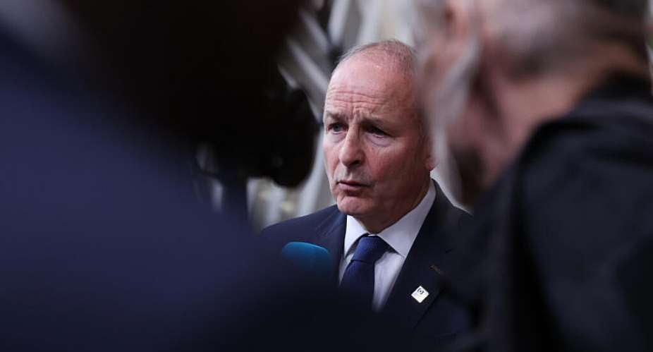 Irelands Prime Minister Micheal Martin speaks with the media as he arrives for the EU summit at the European Council building in Brussels, Oct. 16, 2026 -  Omar Havana, AP