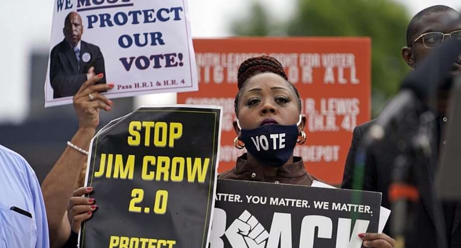 File photo of a protester at a voting rights rally near the Georgia State Capitol in Atlanta, Georgia, taken June 8, 2021. -  Brynn Anderson, AP