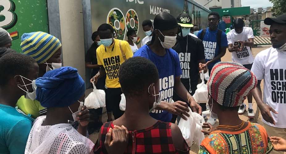 High School Official brand ambassadors donate to head porters in Accra