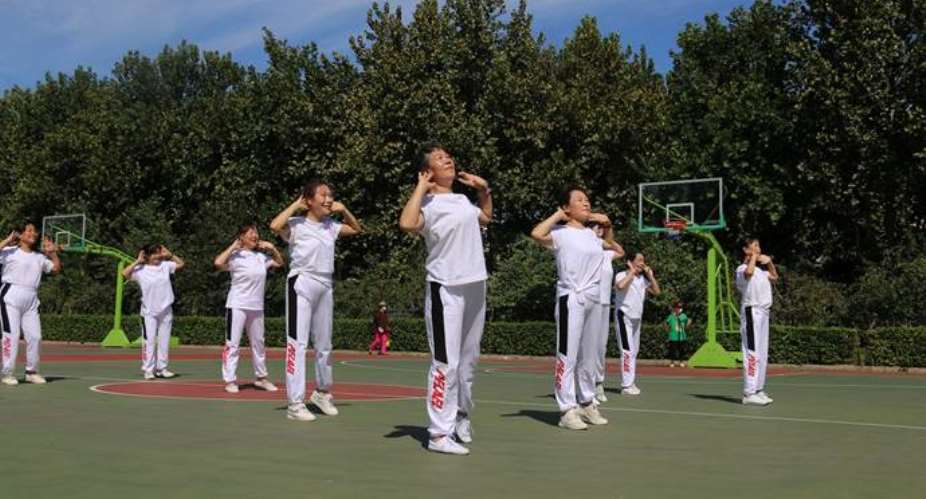 Residents excercise in a community in Daxing district, Beijing. Photo: CGTN Radio