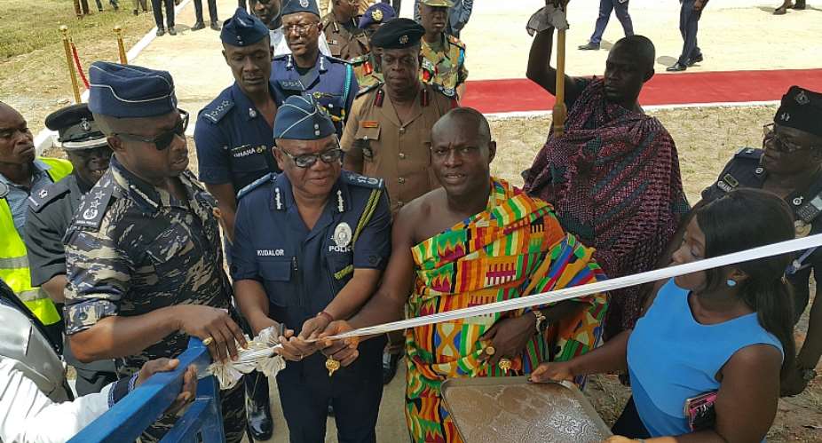The IGP, John Kudalor cutting tape to open the Police Hostel