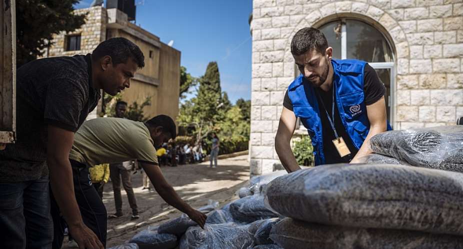 IOM Staff deliver core relief items to a collective center for migrations in Ghosta, Lebanon. Photo Credit IOM 2024/ Muse Mohammed
