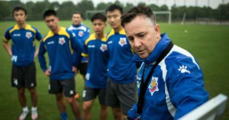 Football: English coach White makes mark in 'ruthless' Chinese football