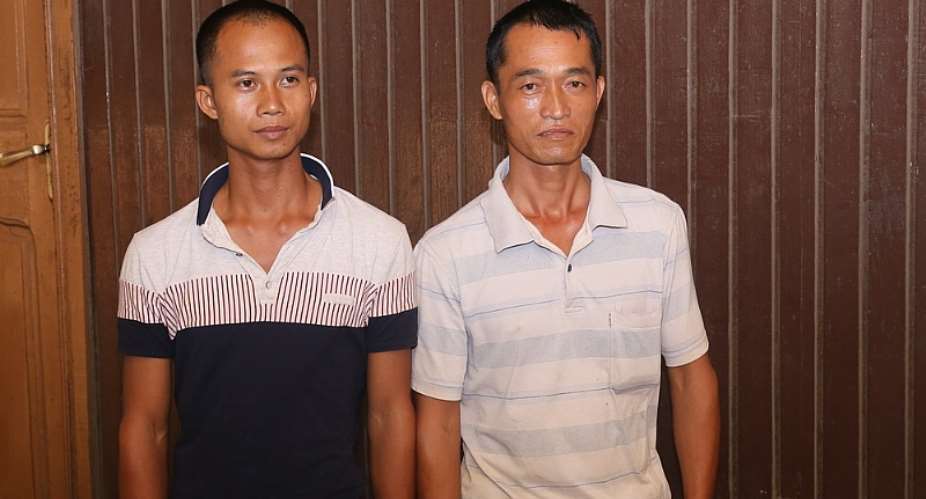 Li Wen Qieng, 28 left and Mo Sin Shan, 35, after their arrest for their involvement in galamsey operations on Cocoa Board land at Wassa Akropong. Picture: SAMUEL TEI ADANO