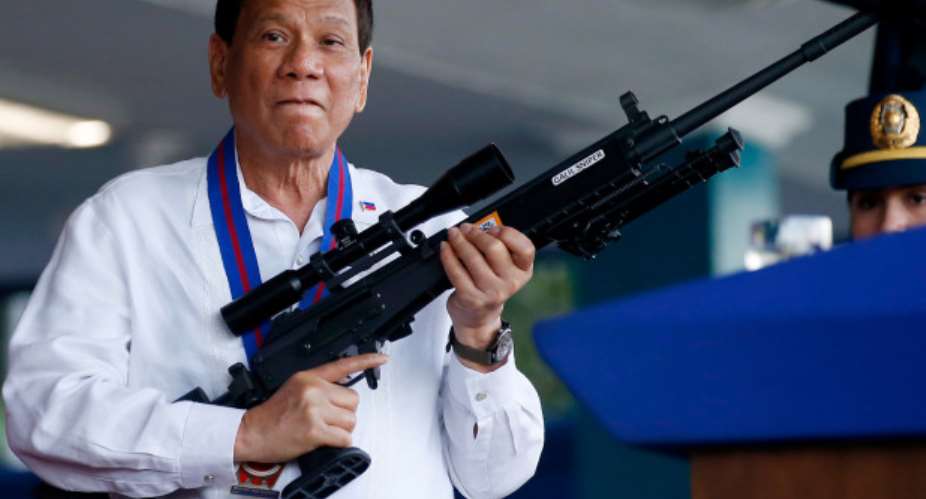 The Philippine leader wants to give the public 42,000 free guns, photo credit: AP