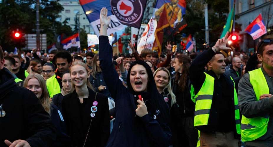 People attend the final Student List - Students Win rally in Belgrade ahead of Sundays parliamentary election. - AP Photo/Marko Drobnjakovic - Marko Drobnjakovic