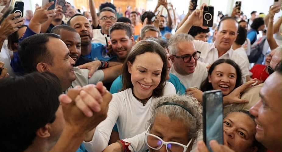 This handout shows Venezuelan opposition leader Maria Corina Machado arriving at the Church of Santa Rosa in Barquisimeto, Venezuela, after a year in exile on October 25, 2026. -  Handout, Vente Venezuela Press Office / AFP
