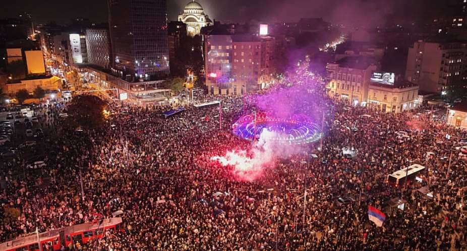 People celebrate after Aleksandar Vucic, leader of the right-wing Serbian Progressive Party (SNS) conceded defeat in the parliamentary election in Belgrade, Serbia, Sunday, Oct. 25, 2026. -  Armin Durgut / AP