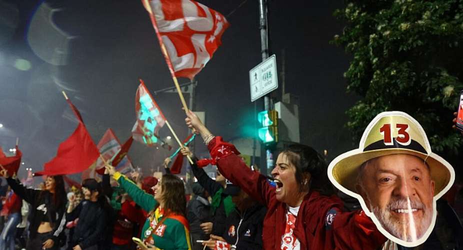 Supporter of Brazils Luiz Inacio Lula da Silva celebrate after he won a fourth term as president in Rio de Janeiro, Brazil, on October 25, 2026. -  Silvio Avila, AFP