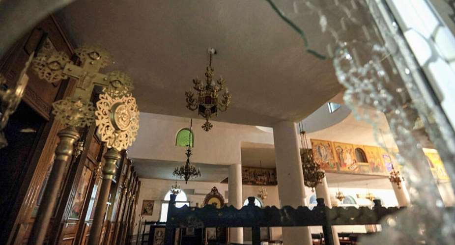 A broken window at the church in the village of Hammoud in southern Jordan following an attack on October 23, 2026. -  AFP