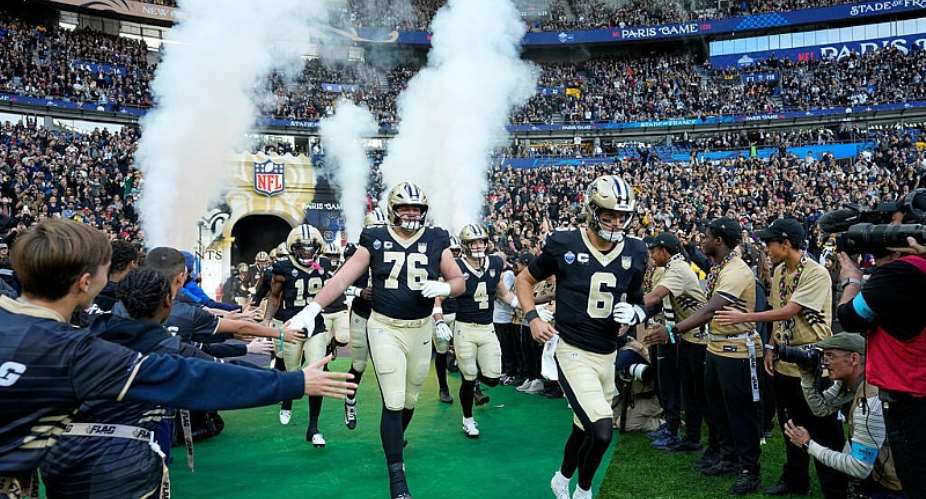 New Orleans Saints quarterback Tyler Shough (6) leads the team onto the field for an NFL football game against Pittsburgh Steelers in Saint-Denis, near Paris, October 25, 2026. - AP Photo/Steve Luciano - Steve Luciano - AP Photo/Steve Luciano - Steve Luciano